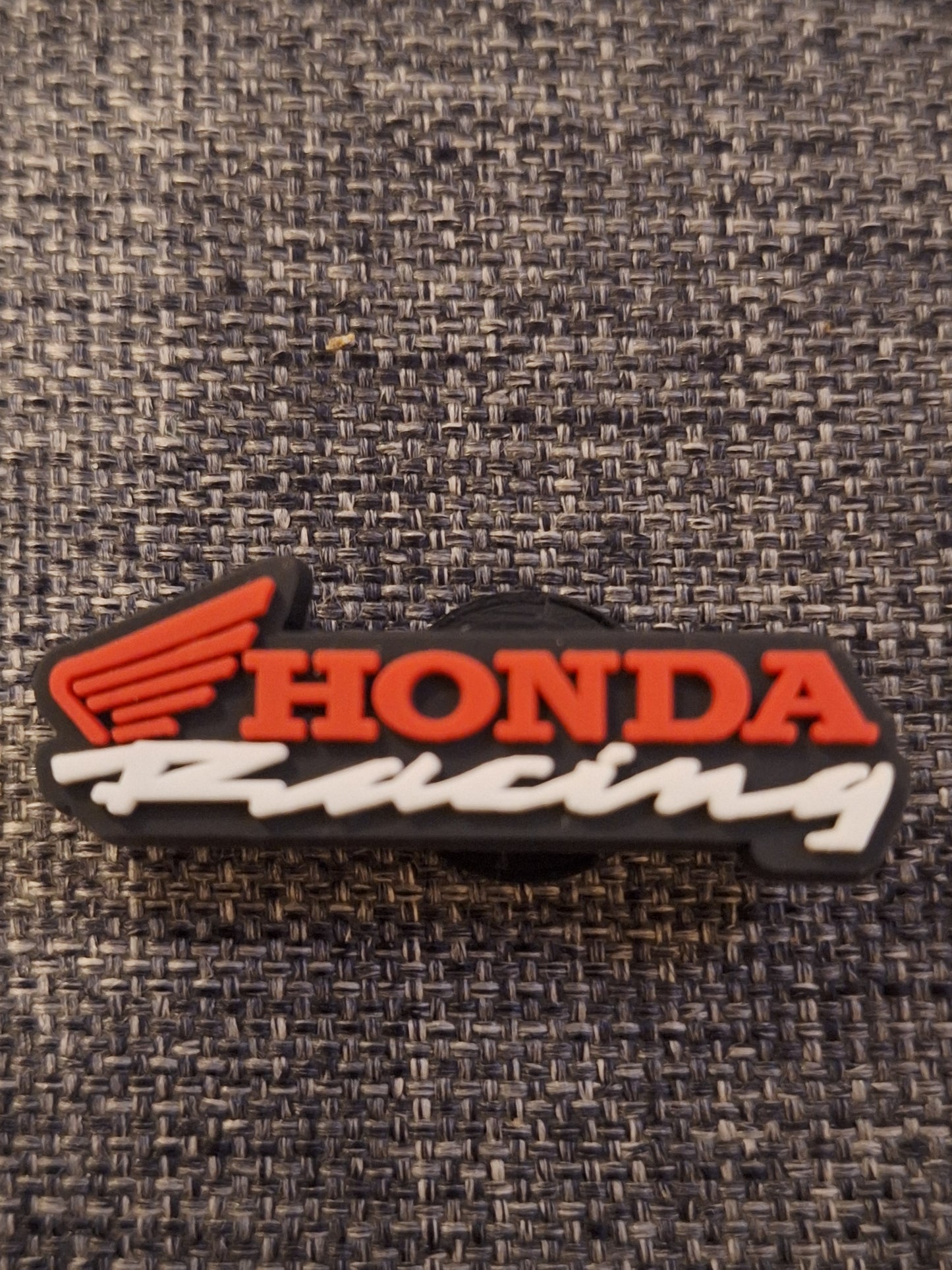 Shoe charms car badges and racing