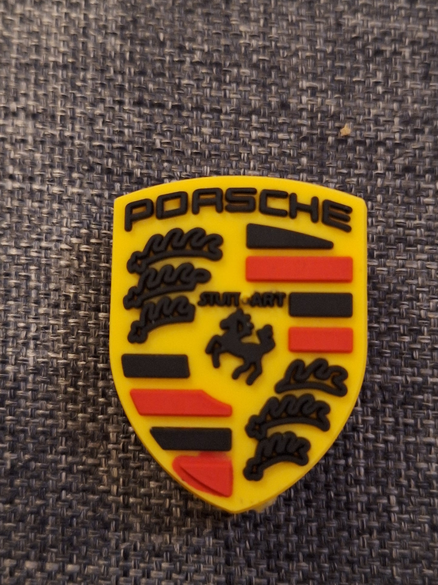 Shoe charms car badges and racing