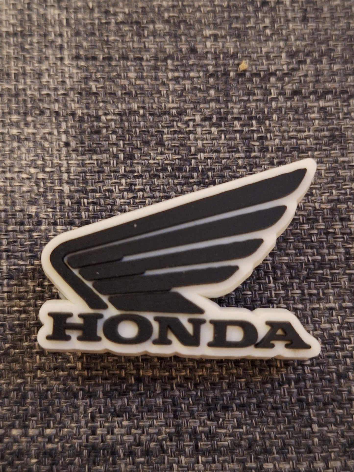 Shoe charms car badges and racing