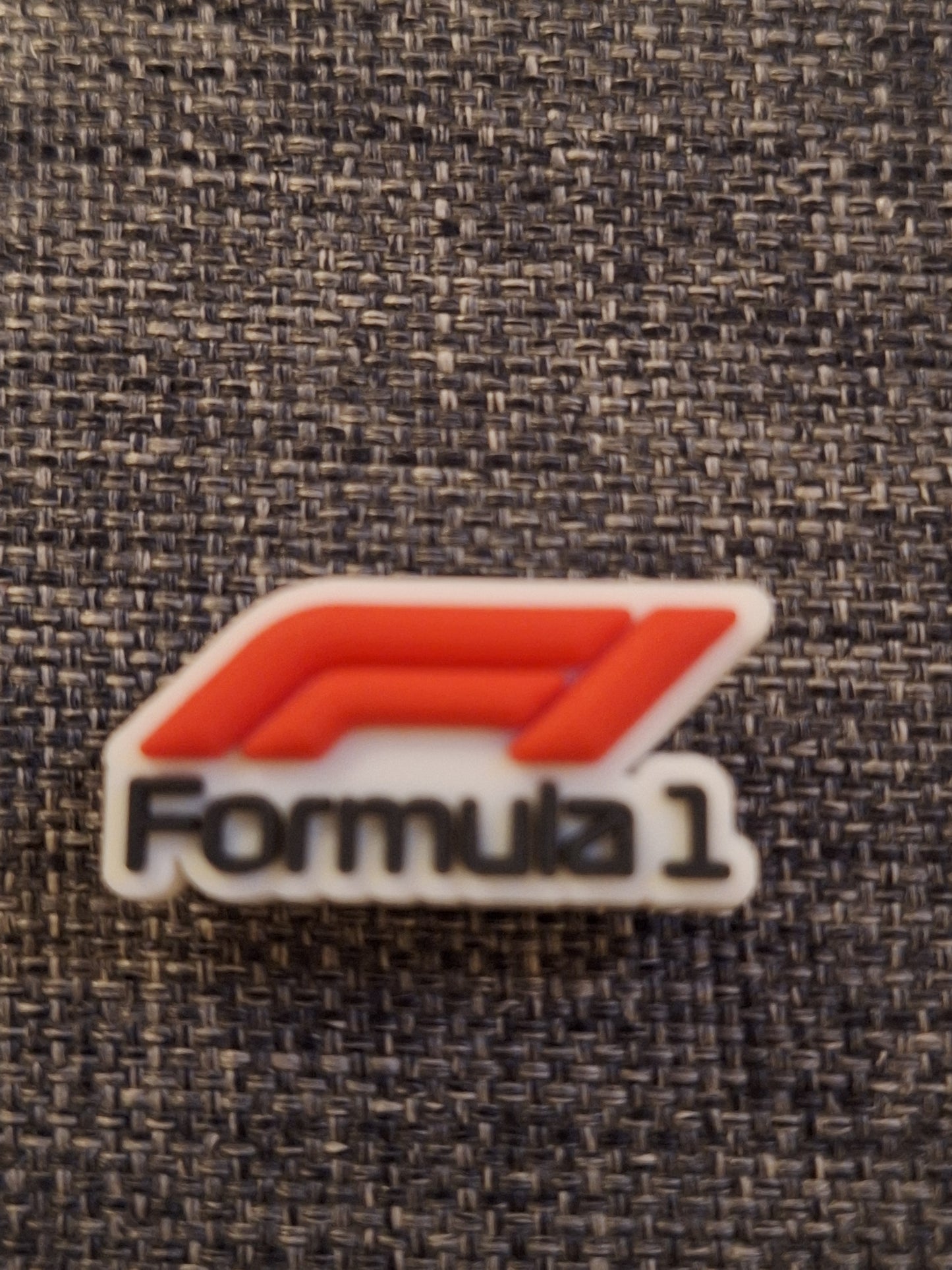 Shoe charms car badges and racing