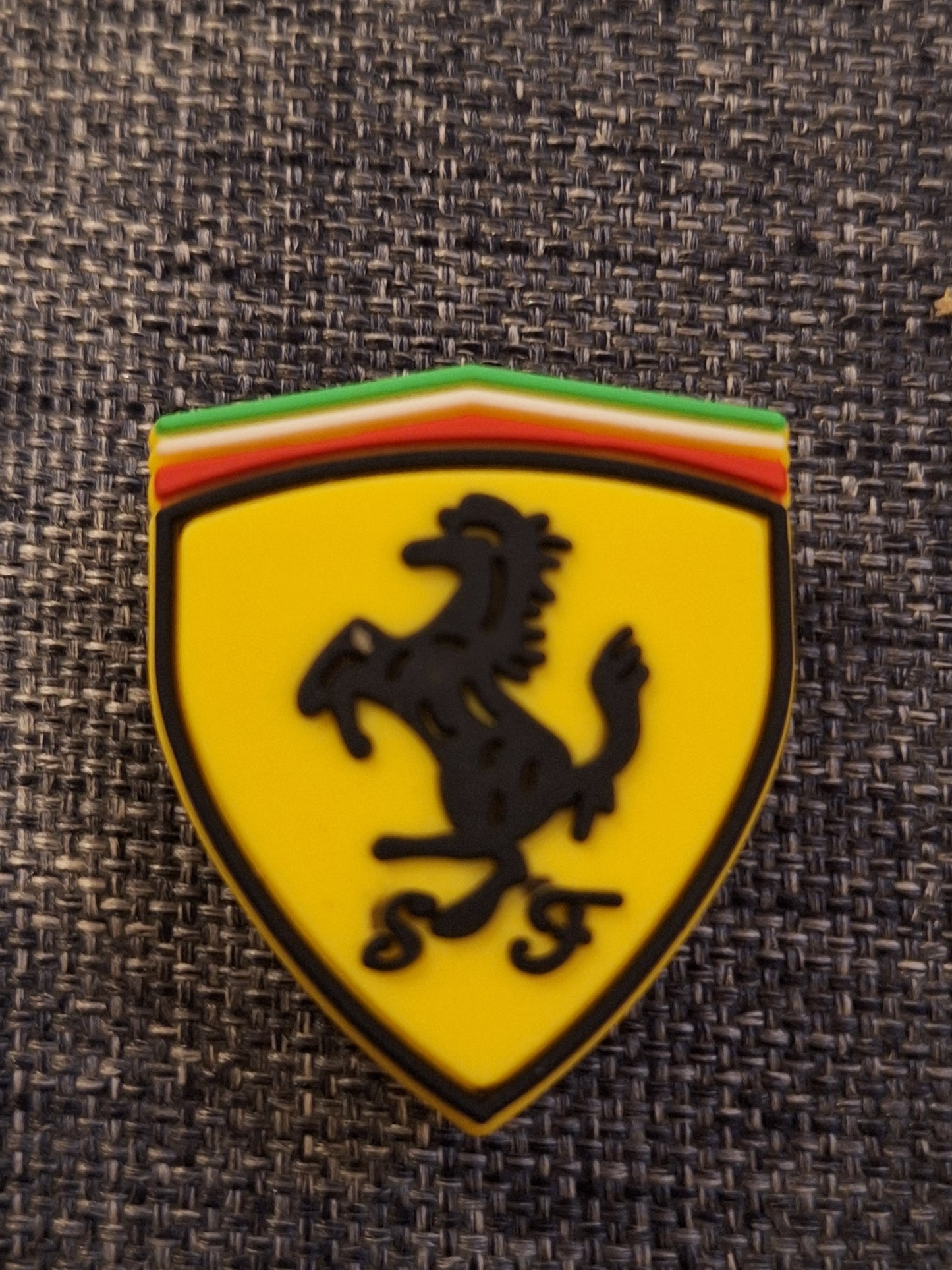 Shoe charms car badges and racing